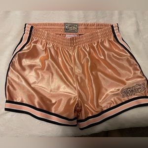 Mitchell & Ness Light pink Raptors shorts